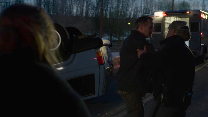 Police Chief Cohen escorts Paxton away from the car accident on a Vermont road.