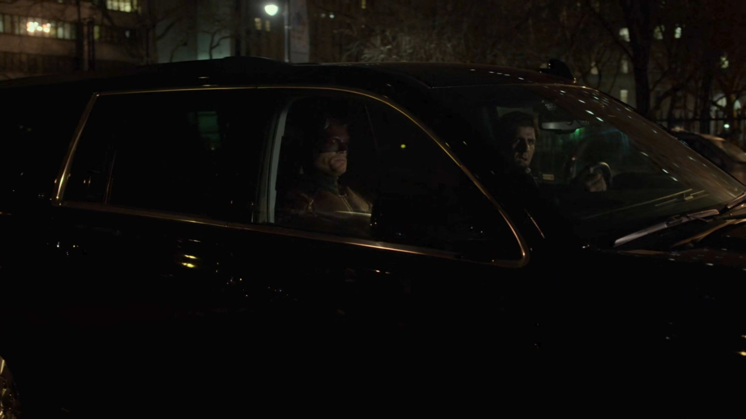 Dex, as Daredevil, and Nadeem in and FBI SUV on street outside Clinton Church.