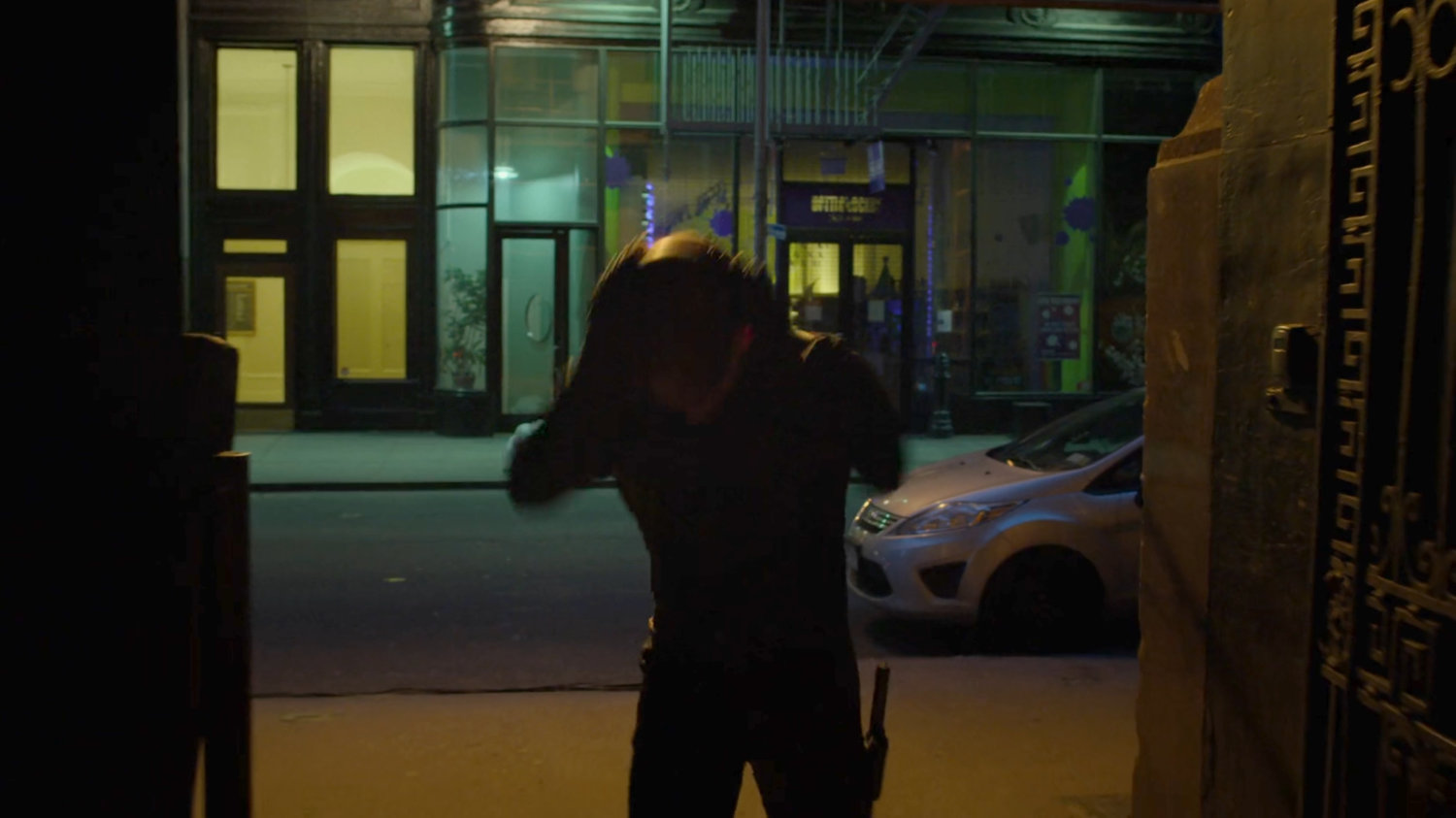 Dex, as Daredevil, walking into an alley.