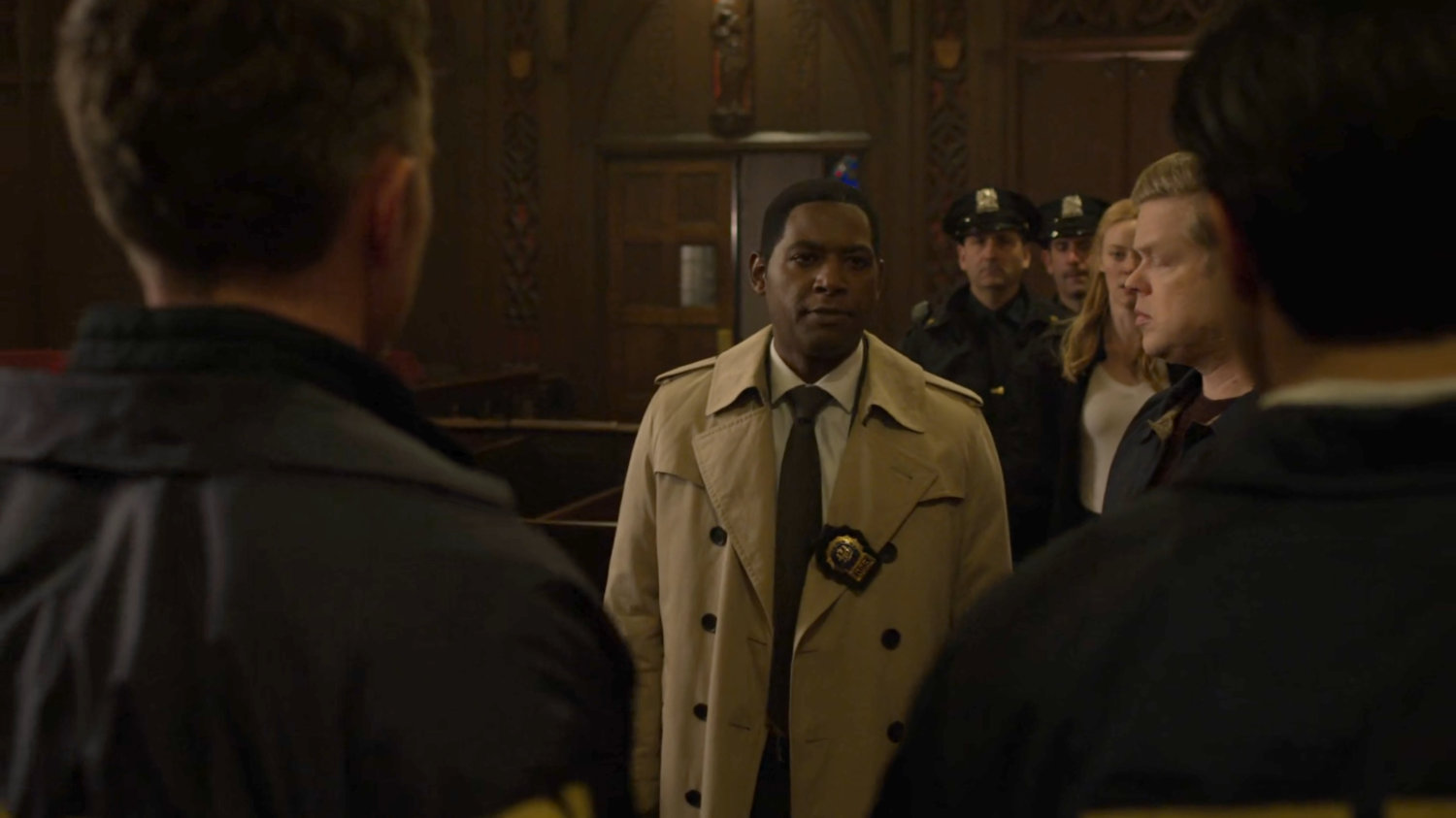 Detective Mahoney with Foggy and Karen talk to Dex and Nadeem inside Clinton Church.