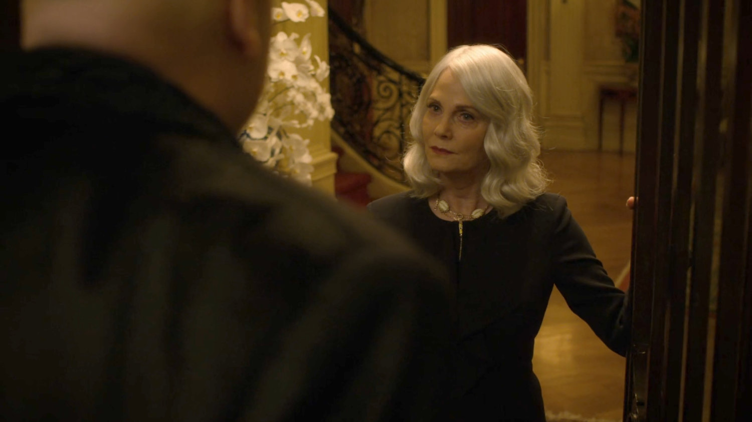 Esther Falb greets Fisk at her front door.