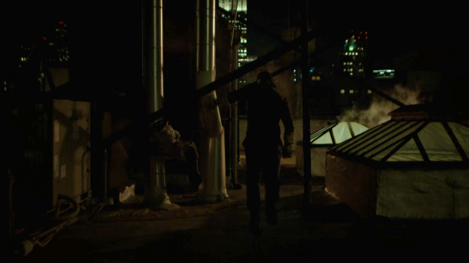 Matt running across a rooftop.
