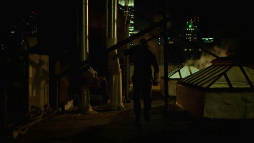 Matt running across a rooftop.