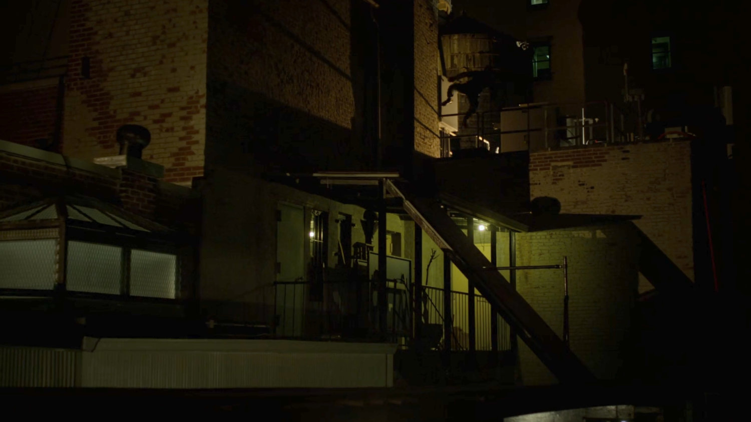 Matt running across a rooftop.