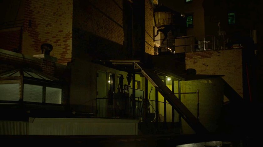 Matt running across a rooftop.