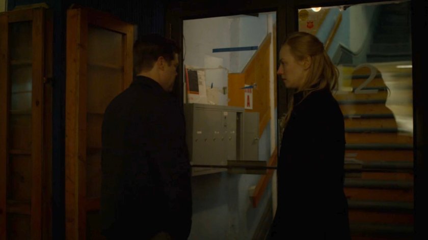 Karen and Foggy enter a building labeled "12."