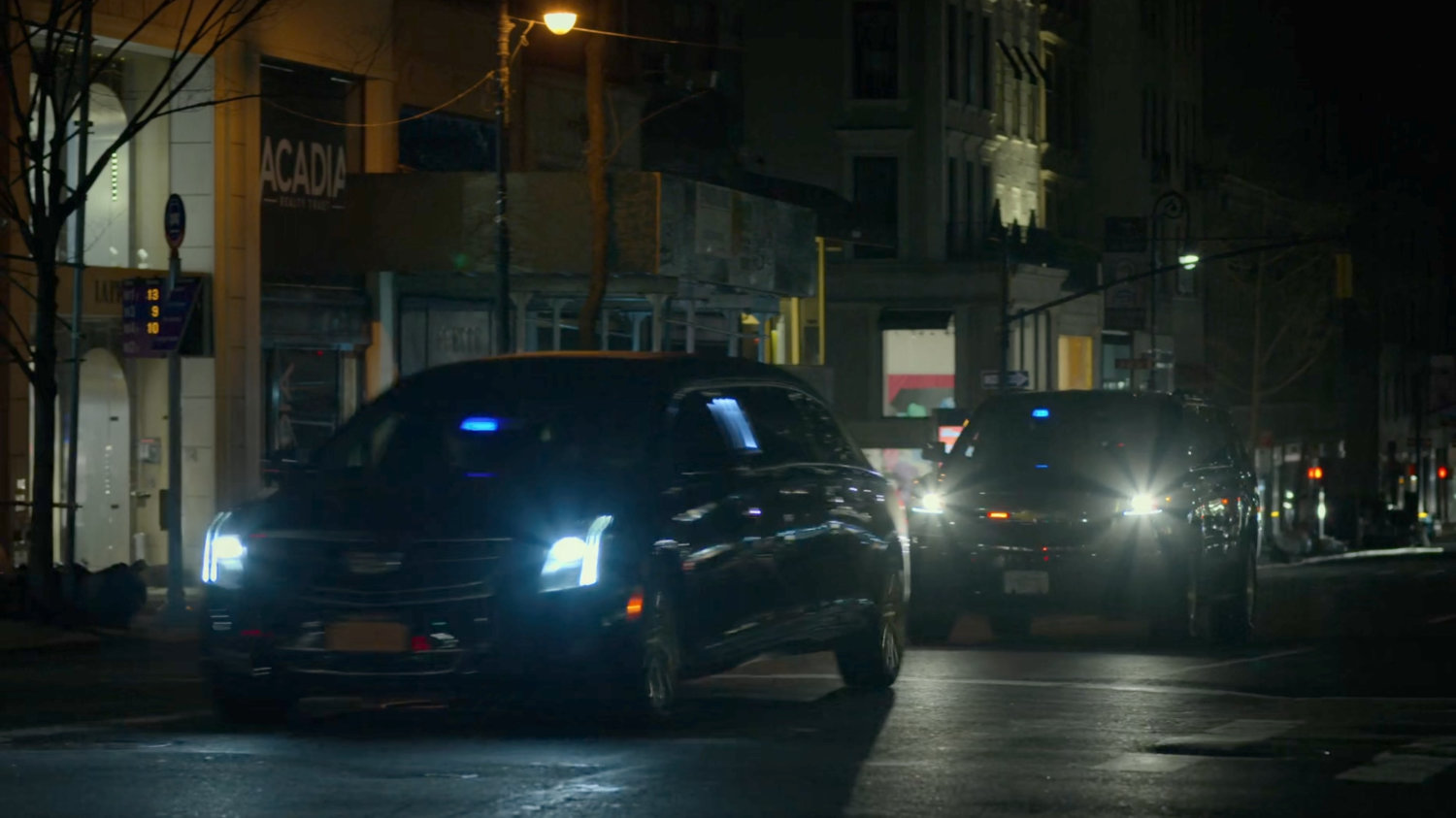 A convoy of Fisk vehicles on a New York Avenue.
