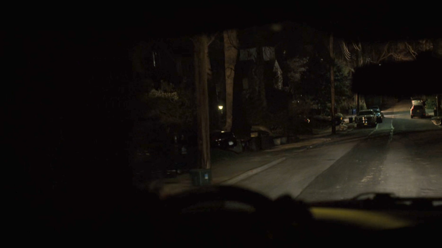 Dark street outside the Nadeem house.
