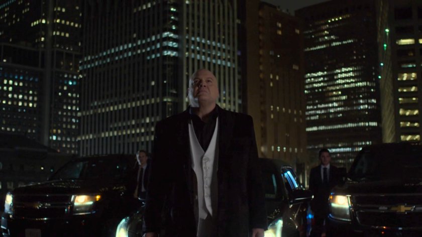 Wilson Fisk on heliport platform at night.
