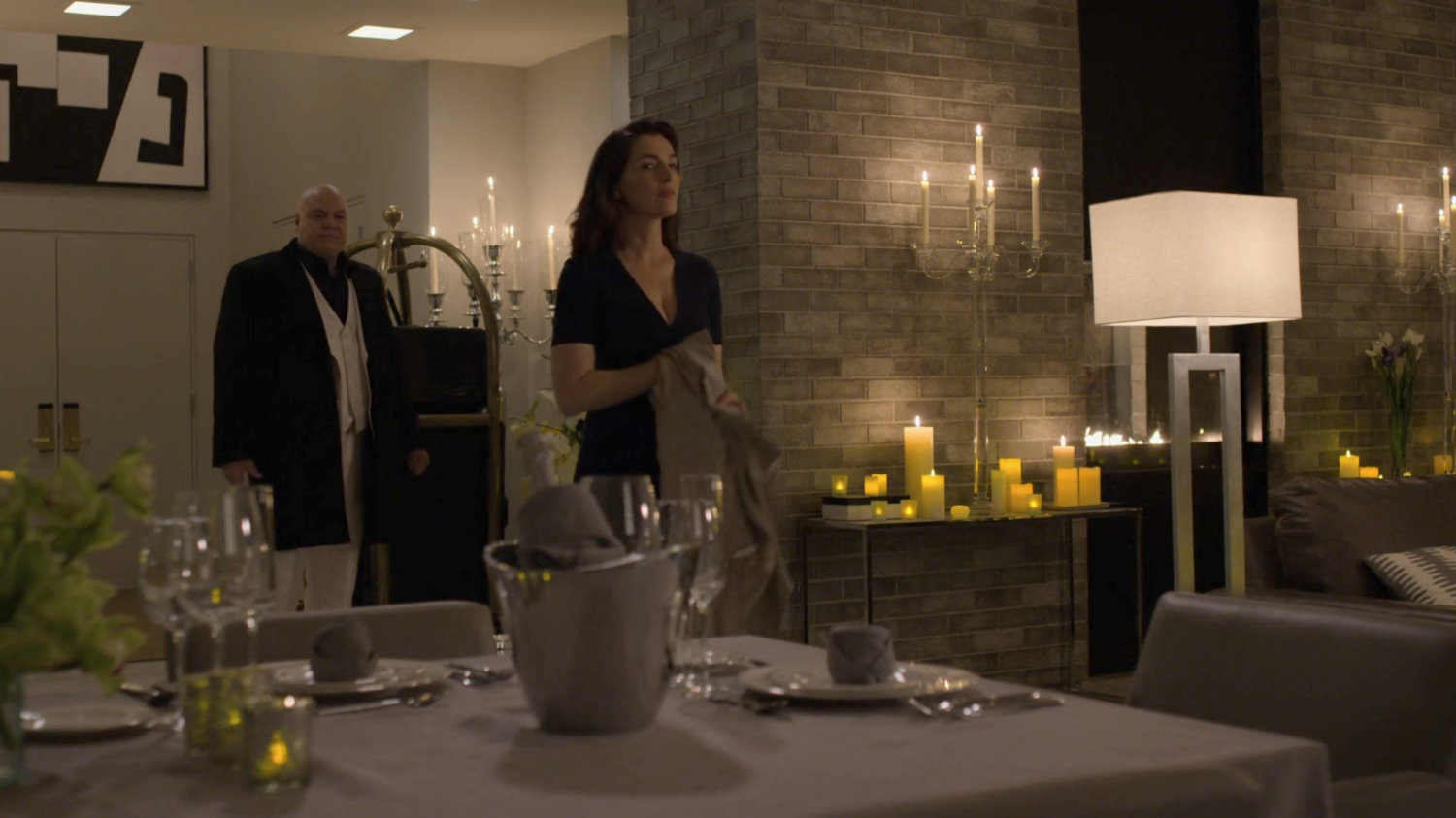 Fisk and Vanessa in penthouse of Presidential Hotel.