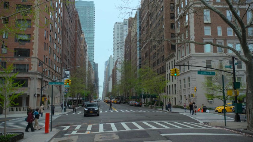 DA Tower's car being pulled over at an intersection.