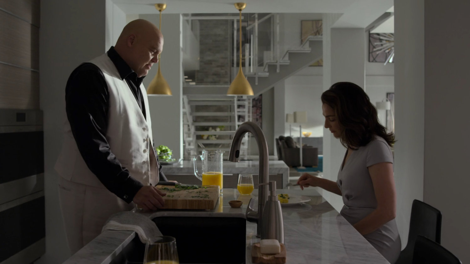 Fisk and Vanessa have breakfast in penthouse of Presidential Hotel.