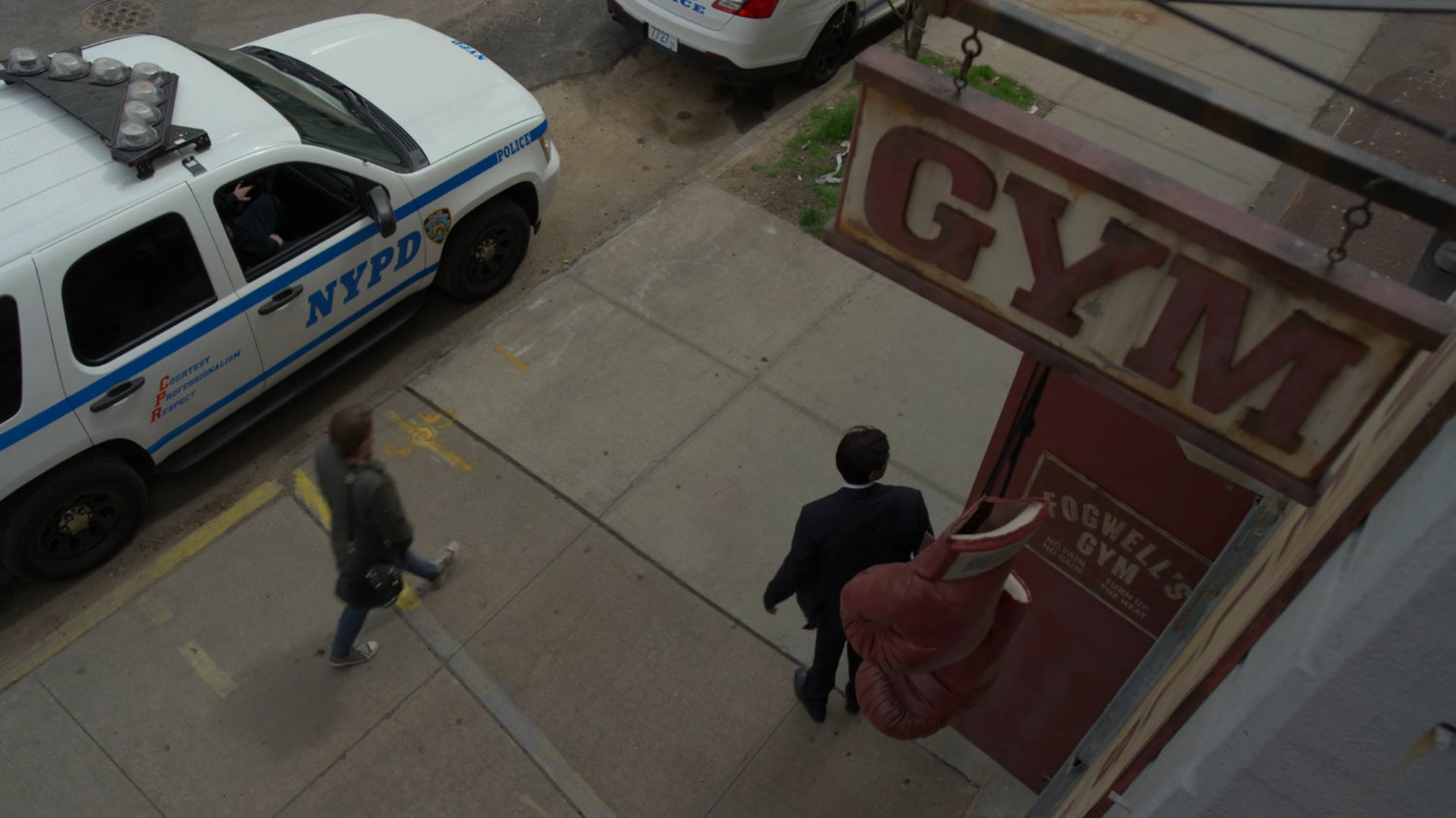 Ray exits Fogwell's Gym.
