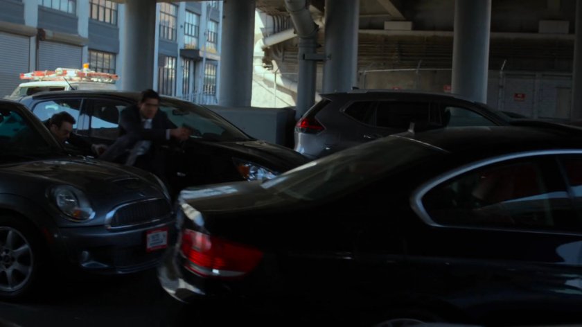 Matt and Nadeem sneak around stopped cars.