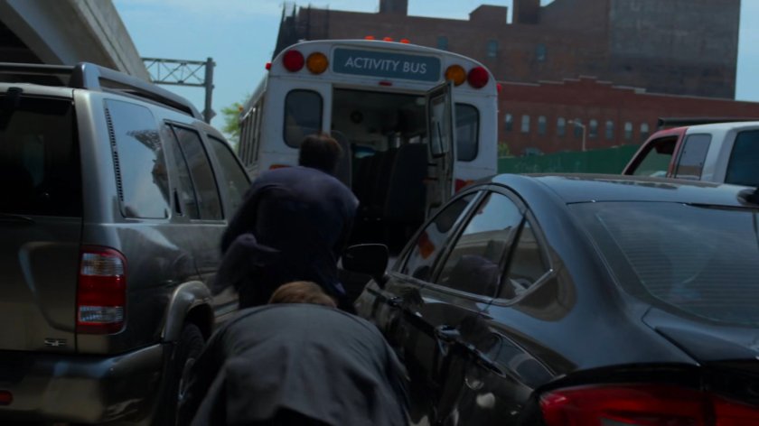 Matt and Nadeem sneak in parked bus in traffic jam.