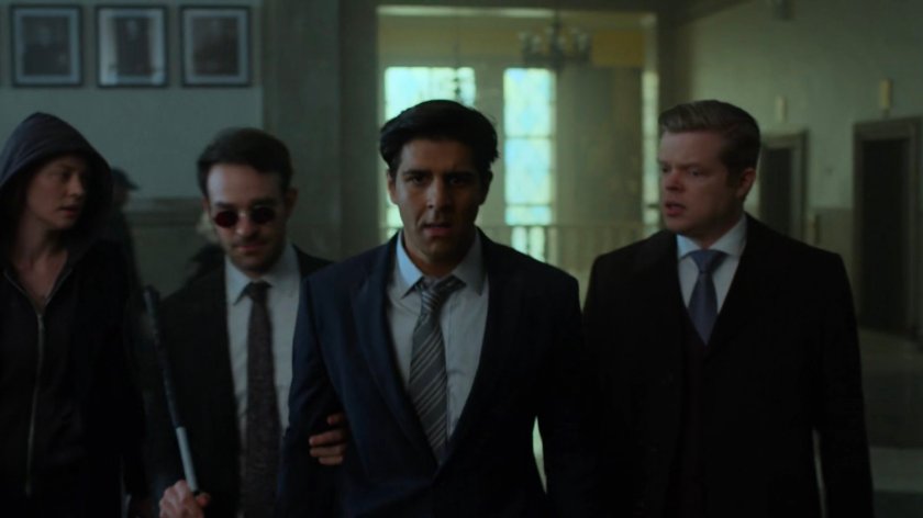 Matt, Nadeem, and Foggy walking through a courthouse.