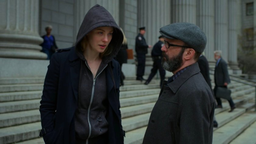 Karen and Ellison on steps outside courthouse.