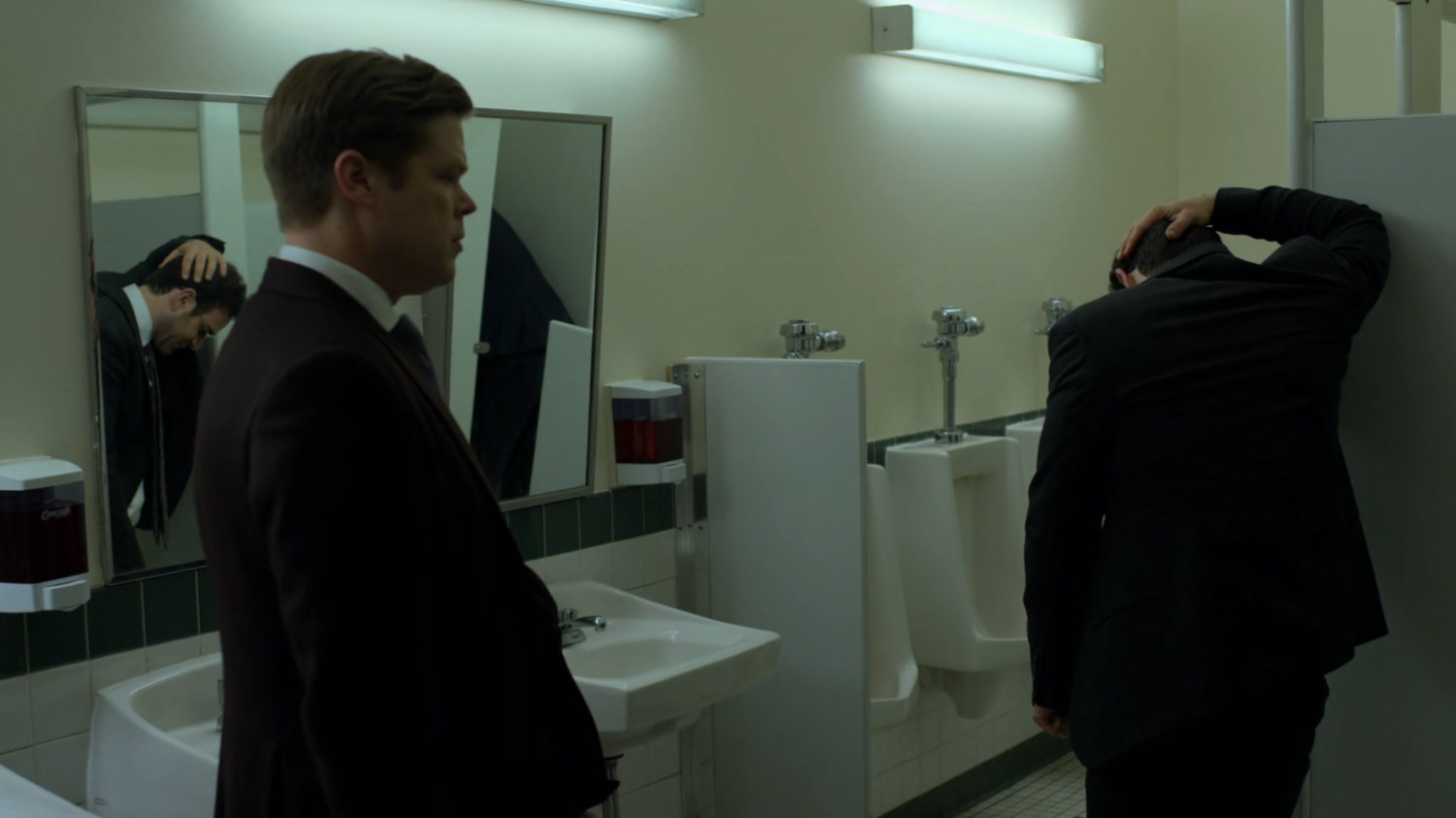 Matt and Foggy in courthouse bathroom.