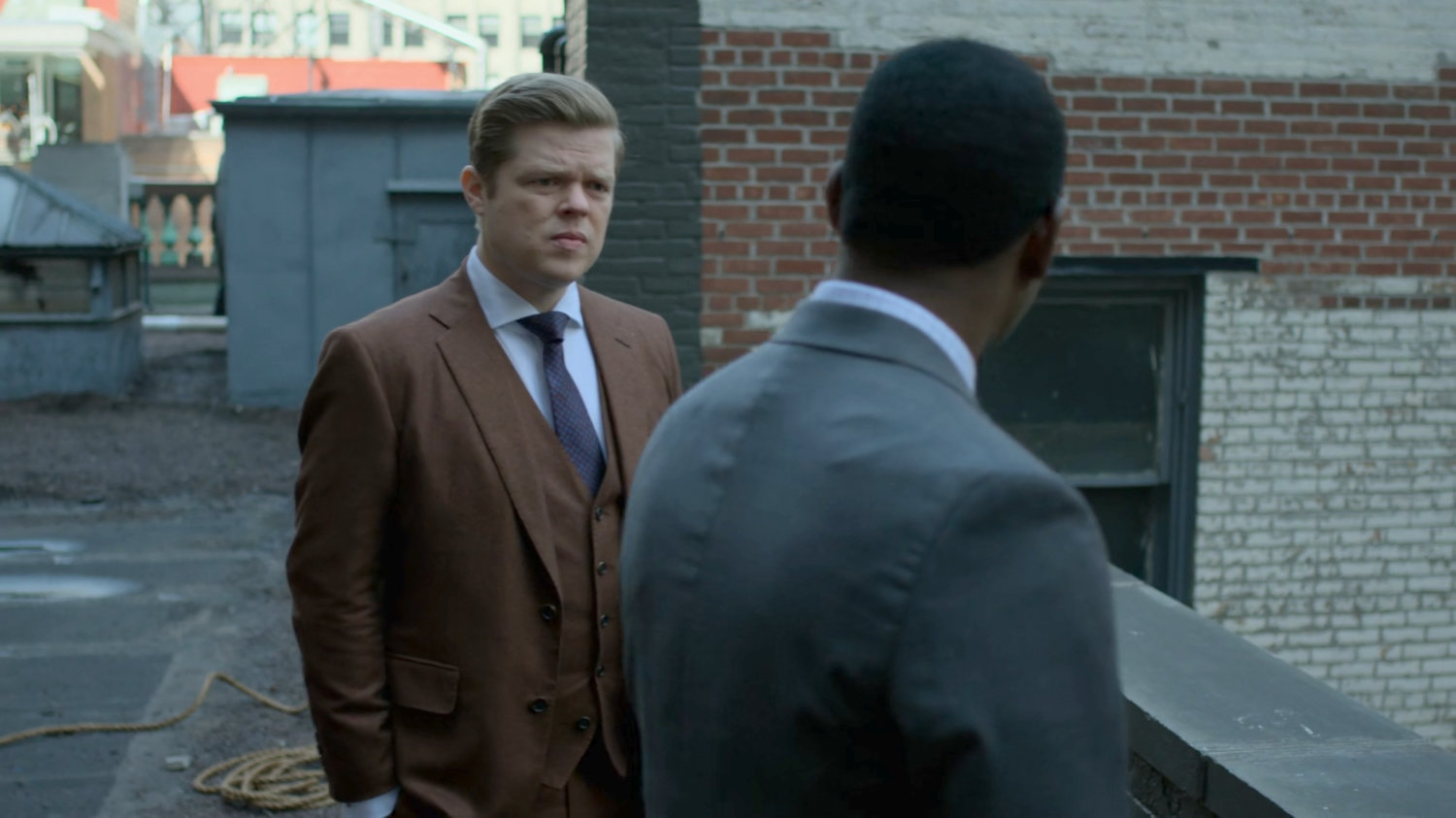 Foggy talking with Detective Mahoney on rooftop.