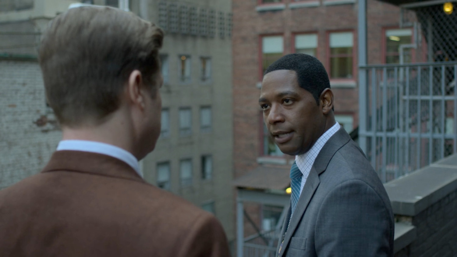 Foggy talking with Detective Mahoney on rooftop.
