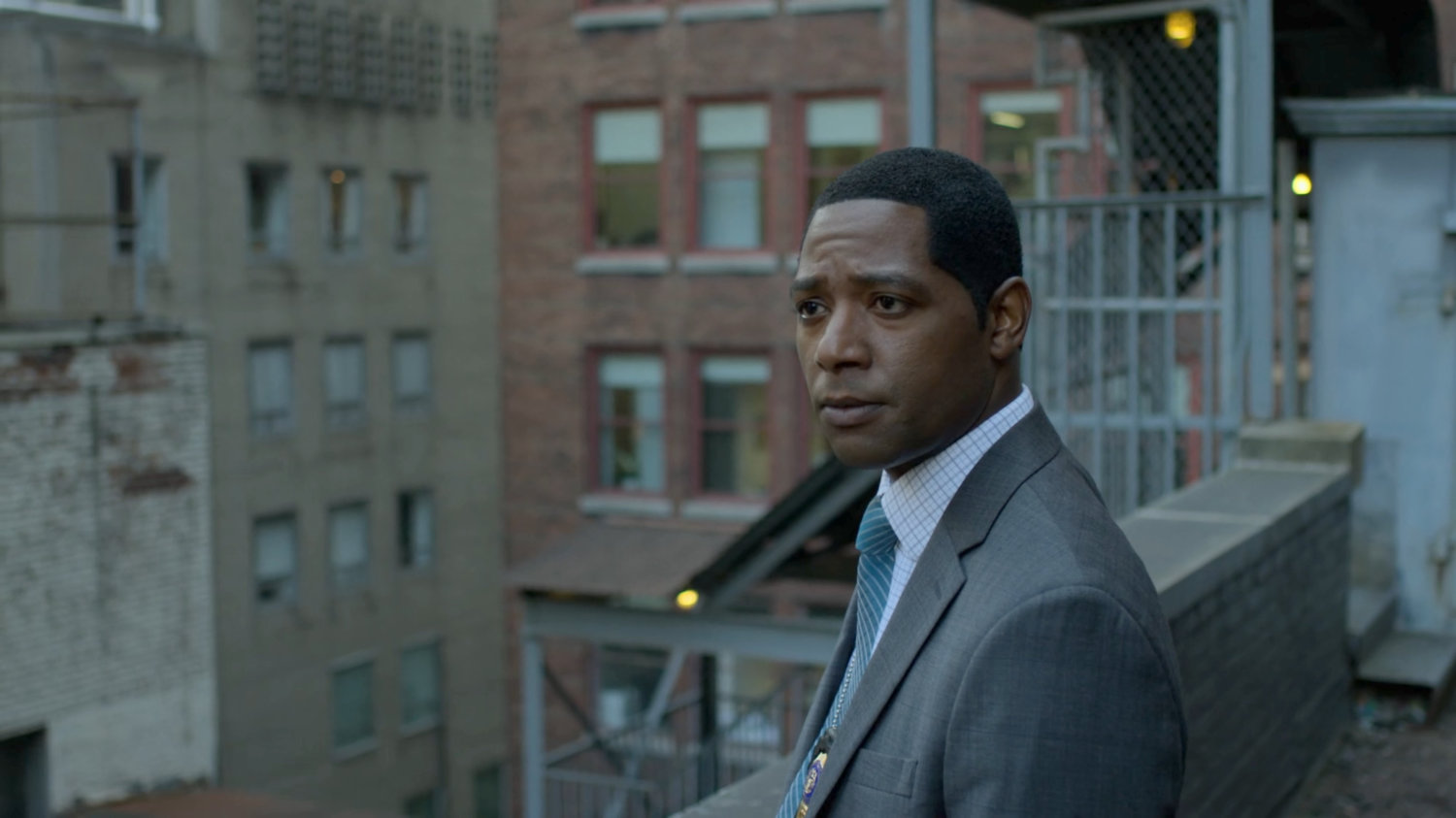 Detective Mahoney on rooftop.