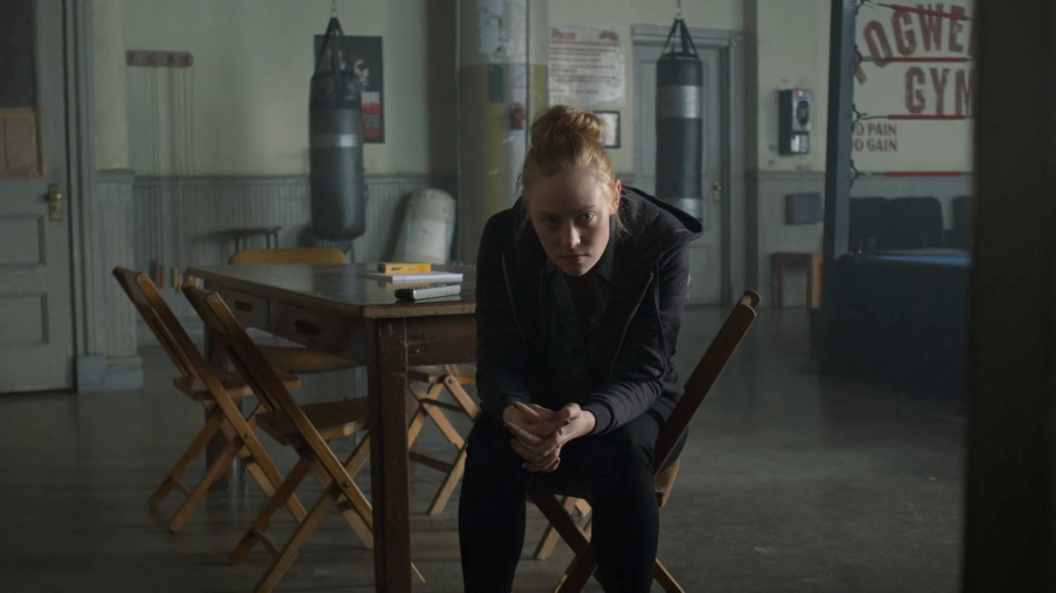 Karen sits in Fogwell's Gym.