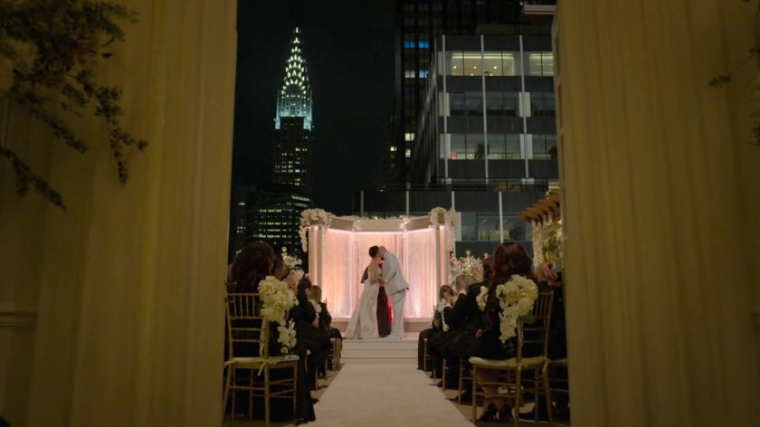 A nighttime wedding ceremony on the Presidential Hotel roof.