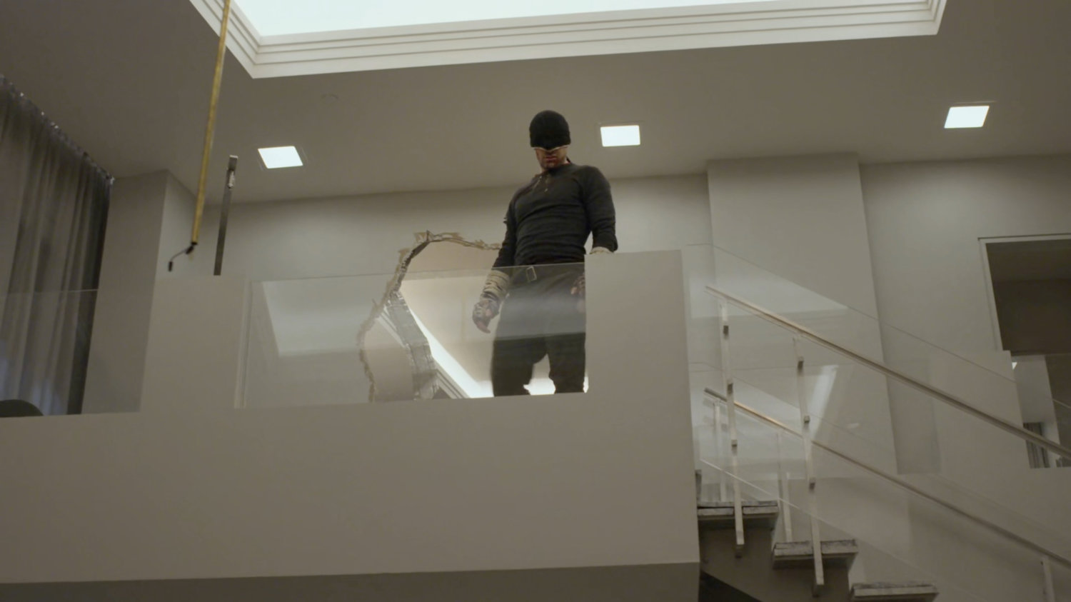 Matt standing on the balcony of the penthouse in the Presidential Hotel.