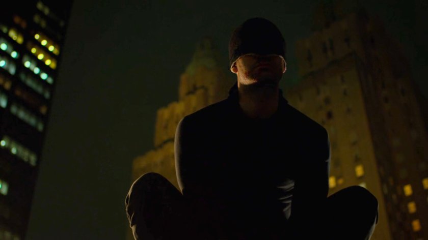 Matt perched on a rooftop ledge above the Presidential Hotel.