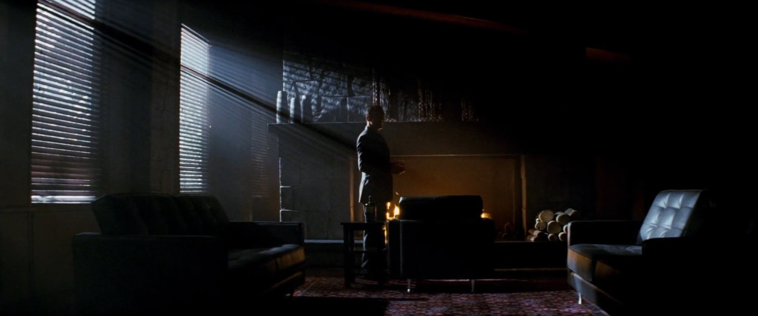 DeMarco by the fireplace in his residence.