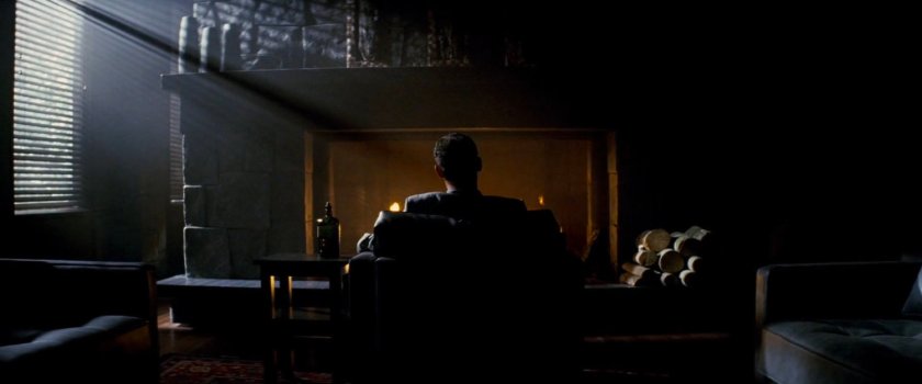 DeMarco by the fireplace in his residence.