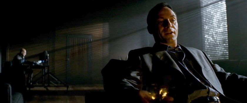 DeMarco and his body guard in a dark room.