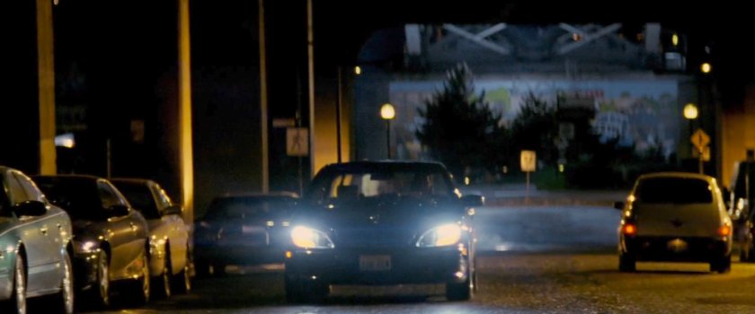 A car pulls up outside Elektra's residence.