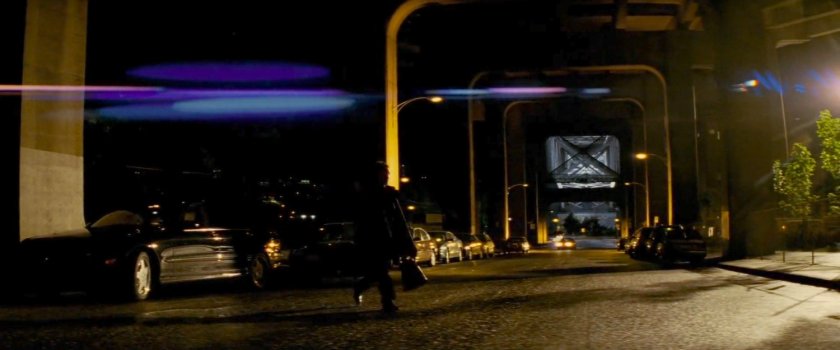 McCabe crossing street outside Elektra's residence.