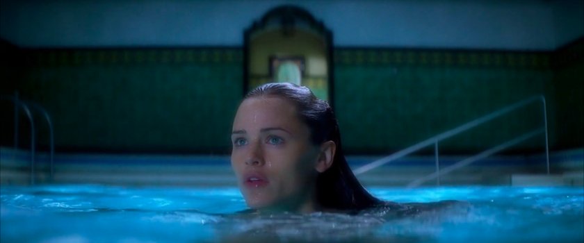 Elektra in the pool at the Natchios mansion.