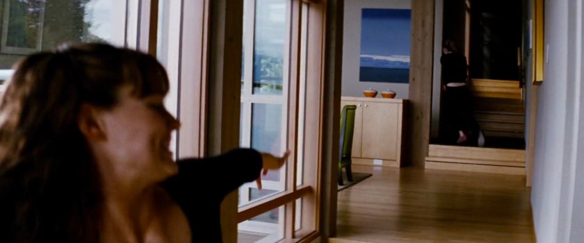 Elektra chasing Abby in the Wheelwright House.