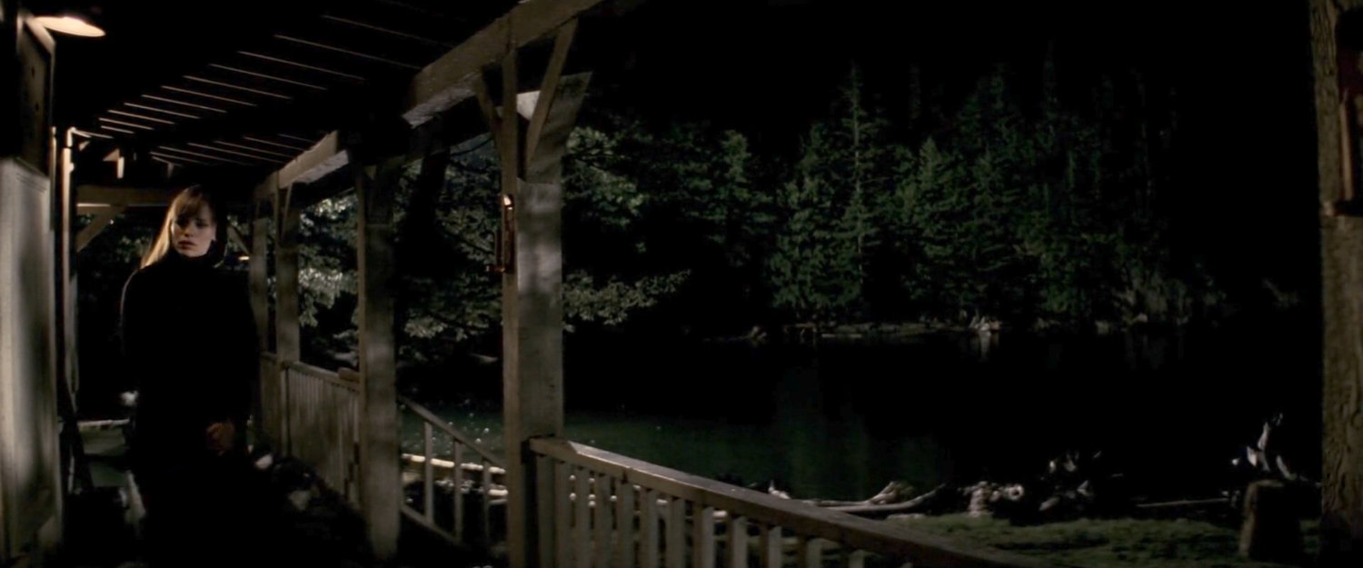 Elektra on the porch of Miller cabin.