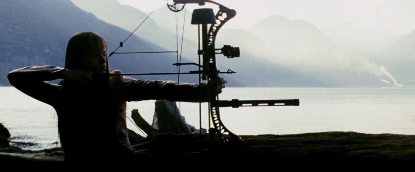 Elektra with a compound bow.