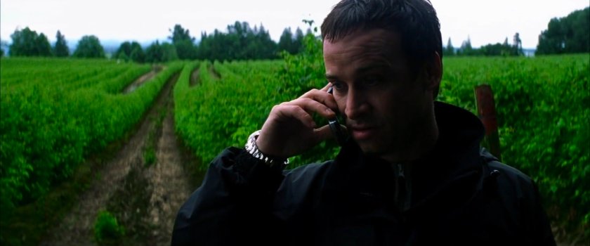 McCabe on the phone in a field outside his house.