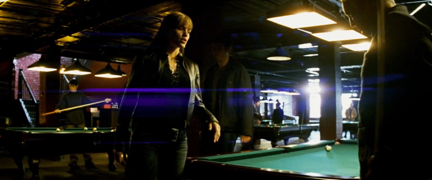 Elektra and Stick inside a seedy pool hall.