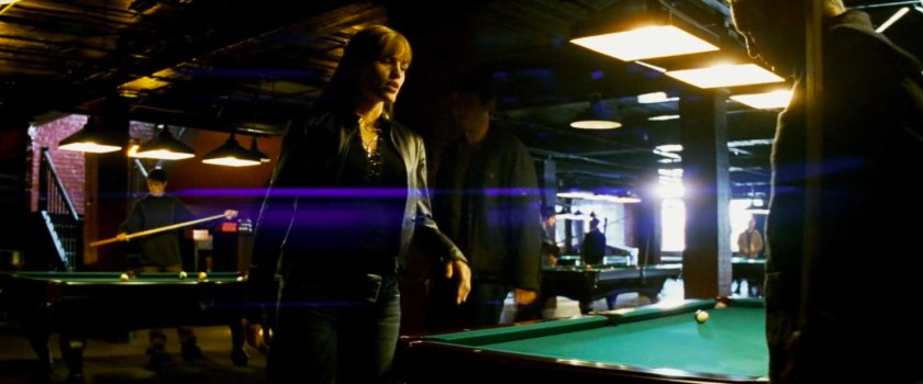Elektra and Stick inside a seedy pool hall.