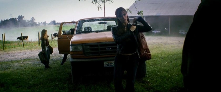 Elektra and pickup truck outside the McCabe farmhouse.