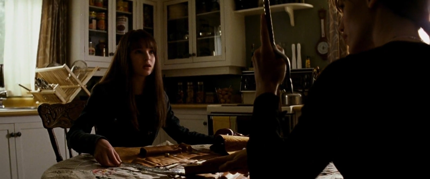 Elektra and Abby in the McCabe farmhouse.