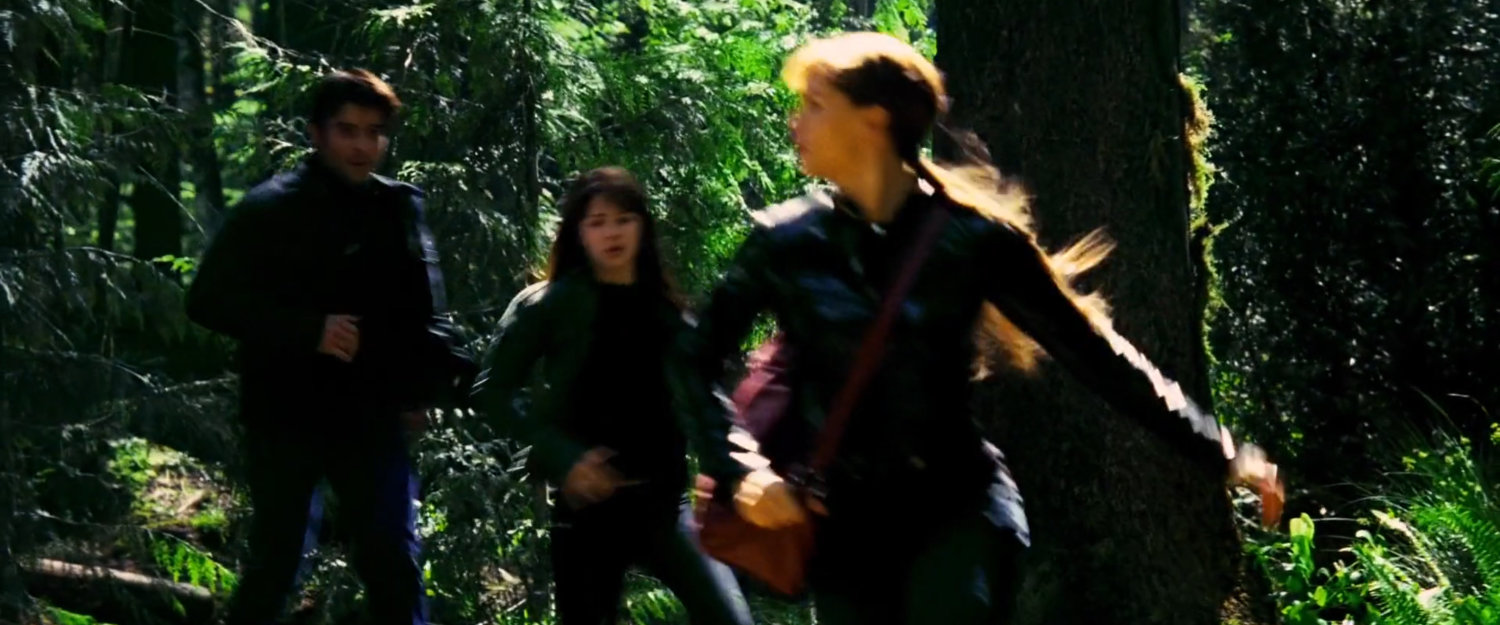Mark, Abby, and Elektra in the woods.