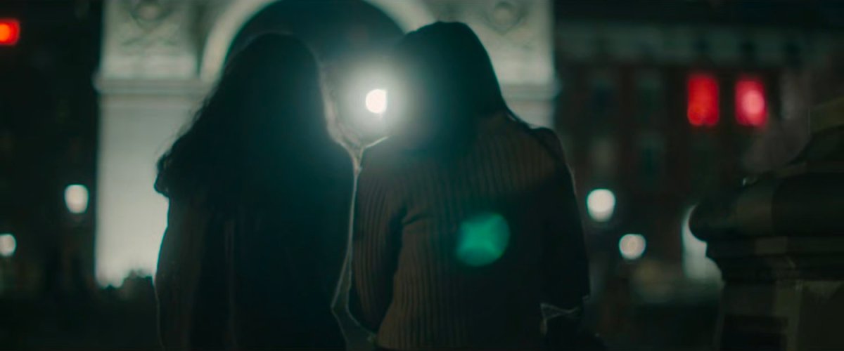Interstitial: couple in front of Washington Square Arch.