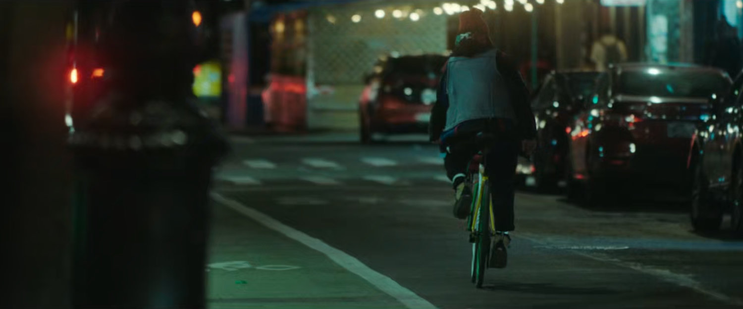 Interstitial: Person on bike.