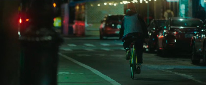 Interstitial: Person on bike.