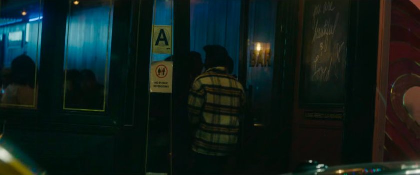 Interstitial: people entering a bar.