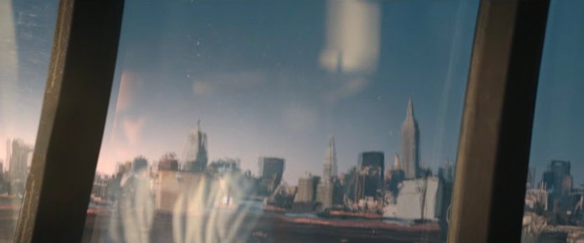 New York reflected in the window of Matt's apartment.