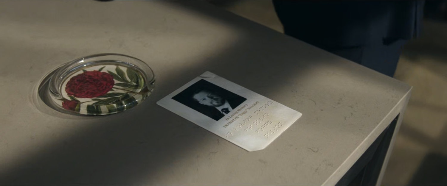 Funeral card for Foggy Nelson on Matt's desk.